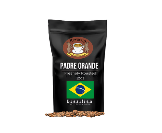 A package of Revocup Brazil Padre Grande coffee with a graphic of a coffee bean and the Brazilian flag indicating the origin of the coffee. The package states 'Freshly Roasted' and '100% Brazilian'.