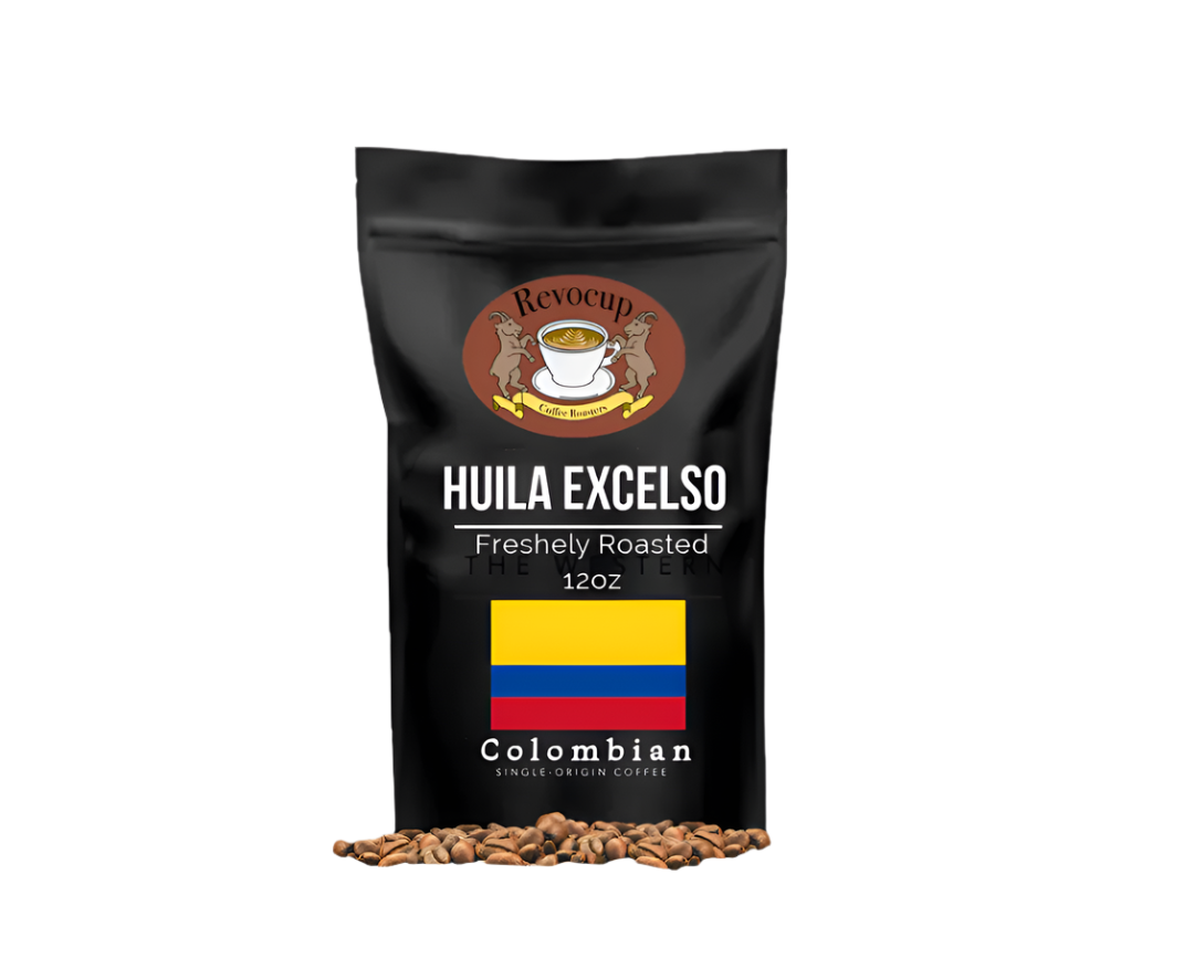 A package of Revocup Colombian Huila Excelso coffee, featuring a black background with a coffee cup logo, a stripe of yellow and red resembling the Colombian flag, and a small image of coffee beans in front.
