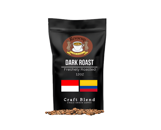 A bag of Revocup Dark Roast coffee with a label indicating it is a craft blend, featuring flags of Colombia and Indonesia, and a weight of 12oz. The bag also displays the coffee beans icon and has a design that includes smoky elements and a coffee cup graphic.
