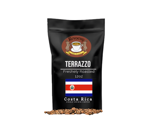A package of Revocup coffee, labeled 'Terrazzo', featuring a graphic of a coffee bean and the flag of Costa Rica, indicating the source of the coffee.