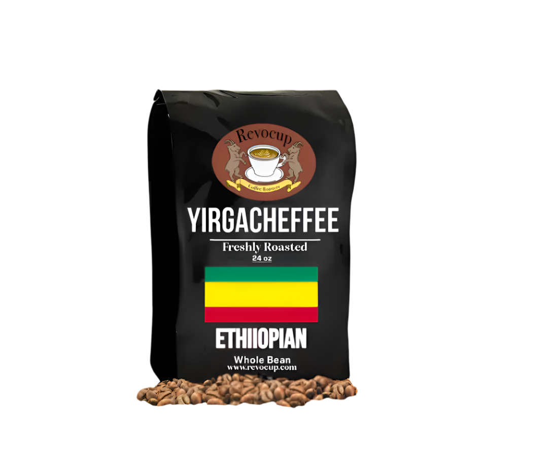 A black bag of Revocup Yirgacheffee Ethiopian Whole Bean coffee, 24 oz, stands upright on a pile of roasted coffee beans. 